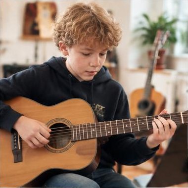 Gitaar, akoestisch tijdens muziekles